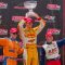 Ryan Hunter-Reay (centre), Charlie Kimball (left) and Mike Conway (right) stand on the podium at Honda Indy Toronto on Sunday afternoon (JP Dhanoa)
